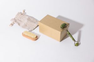 selfcare box with brush and jade face roller
